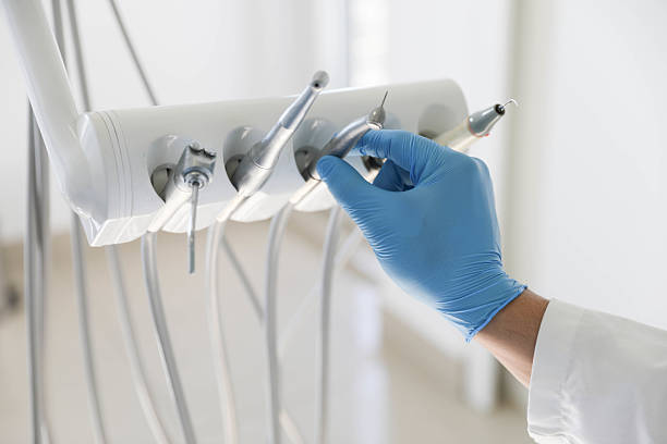 Professional Tooth Extraction technician working in Kings Park, VA